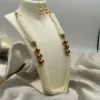 Beaded Mala Necklace Set with pearls, red beads, and matching earrings