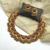 Bridal gold plated choker necklace set with intricate floral motifs and matching earrings.